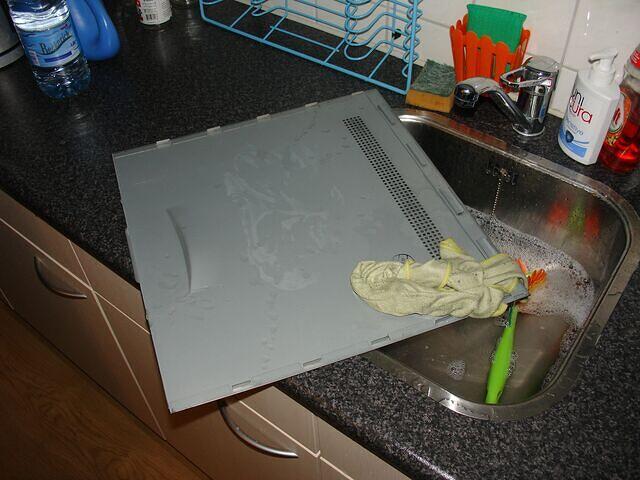 Cleaning Case side panel, dust visible